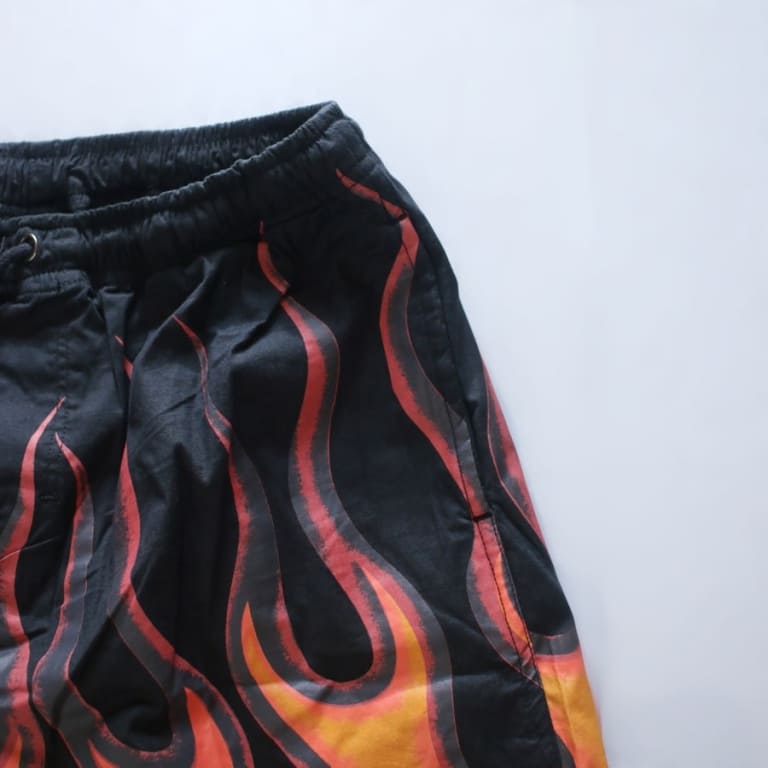 tpvs-flame board shorts