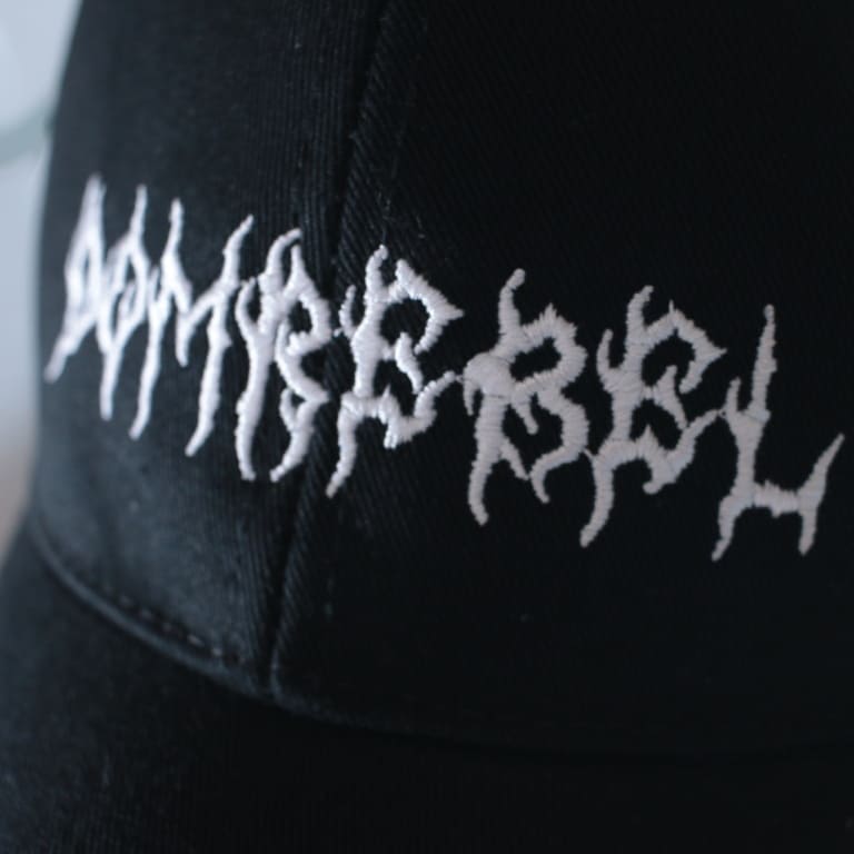 domrebel-logo-cap